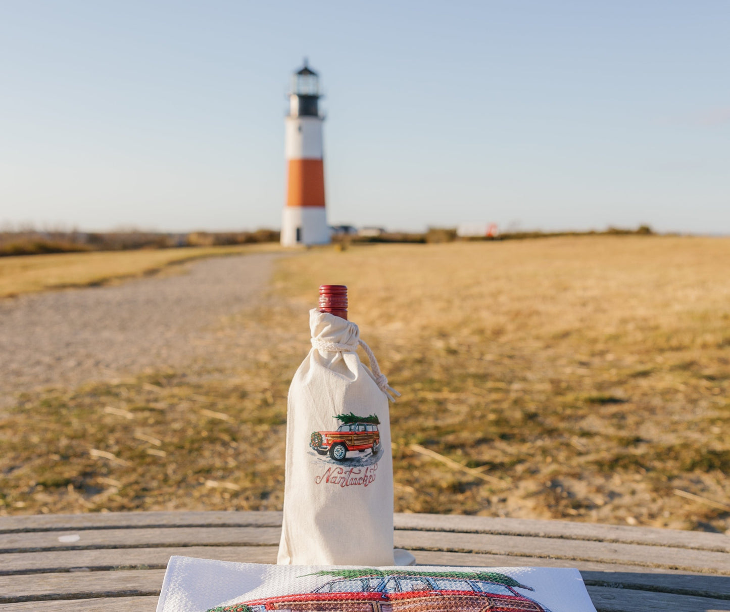 Nantucket Holiday Wine Bag - My Nantucket Shop
Shop authentic Nantucket-themed merchandise, clothing, towels, beanies, and stickers, designed with love and shipped directly from Nantucket, Massachusetts. Celebrate northeast island charm with unique, high-quality products perfect for every ACK/ Nantucket enthusiast. My Nantucket Shop is a boutique clothing store from ACK representing the east coast lifestyle.
