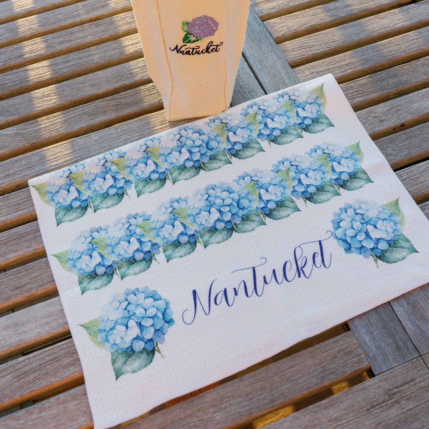 Hydrangea Kitchen Towel - My Nantucket Shop
Shop authentic Nantucket-themed merchandise, clothing, towels, beanies, and stickers, designed with love and shipped directly from Nantucket, Massachusetts. Celebrate northeast island charm with unique, high-quality products perfect for every ACK/ Nantucket enthusiast. My Nantucket Shop is a boutique clothing store from ACK representing the east coast lifestyle.
blue floral hydrangeas dish cloth wash cloth